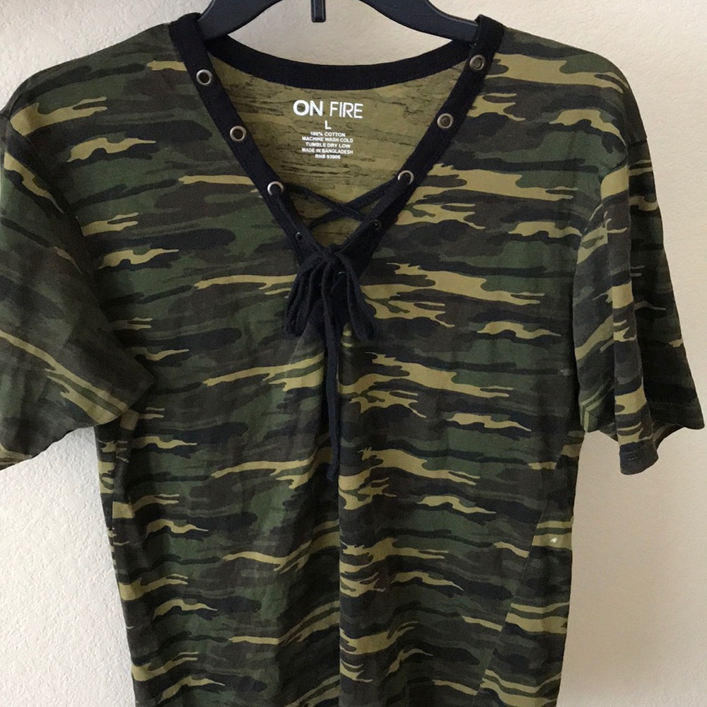 Army print tee shirt with string tie on chest.